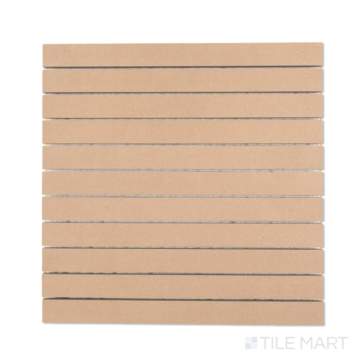 Flat-lay photo of Sahara Rose 1x12 matte porcelain mosaic tiles, displaying soft rose-colored strips arranged in a clean mosaic pattern.