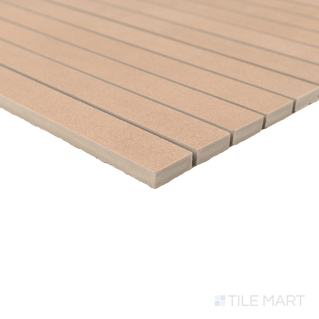 Corner close-up of Sahara Rose 1x12 matte porcelain mosaic highlighting its soft blush hue and refined edge finish.