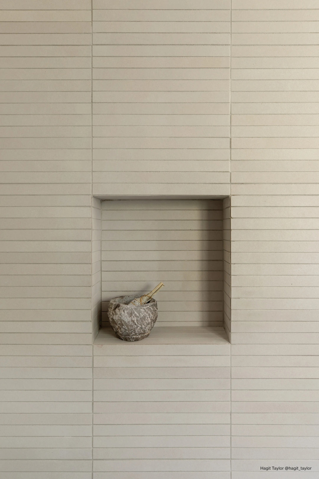 Sahara White 1x12 matte porcelain mosaic showcases sleek white tones in a narrow strip layout for modern appeal.