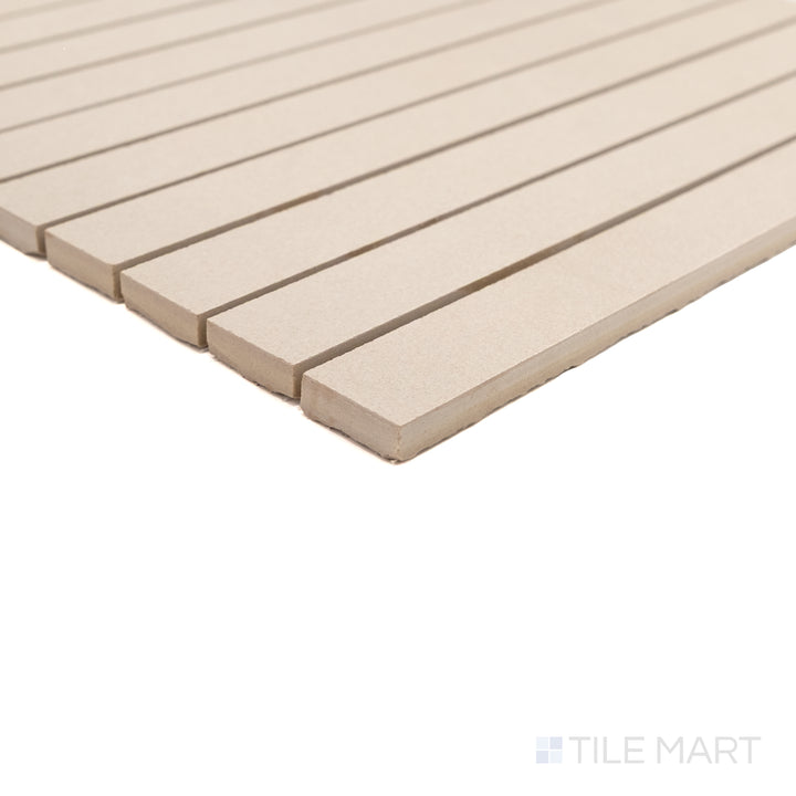 Corner close-up of Sahara White 1x12 matte porcelain mosaic showing its bright tone and clean matte edge.