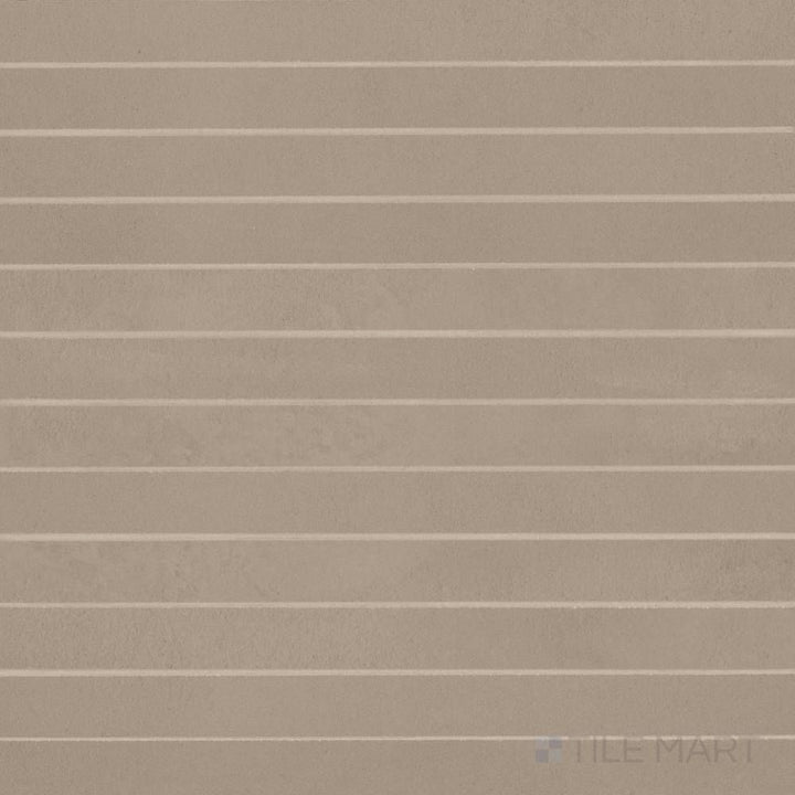 Displayed in a narrow format, Sahara Taupe 1x12 matte porcelain mosaic tile showcases soft taupe hues and refined texture for modern surfaces.