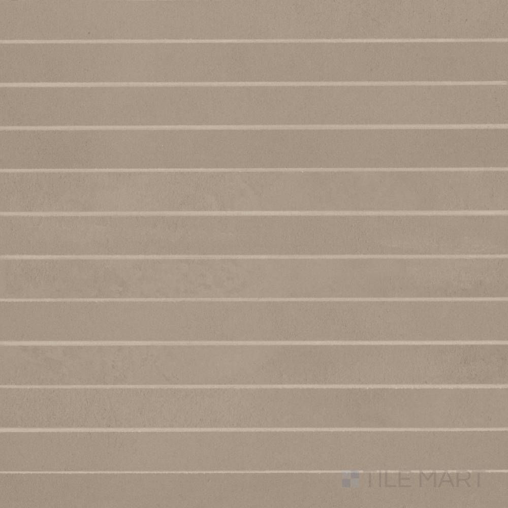 Displayed in a narrow format, Sahara Taupe 1x12 matte porcelain mosaic tile showcases soft taupe hues and refined texture for modern surfaces.