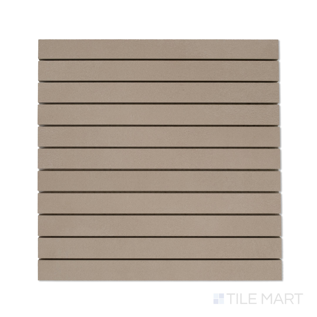 Flat-lay shot of Sahara Taupe 1x12 matte porcelain mosaic, showing slim taupe-colored strips in a precise linear configuration.