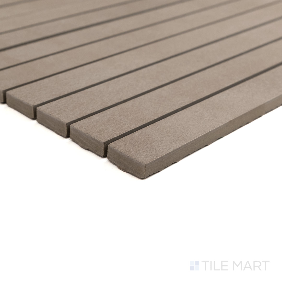 Corner detail of Sahara Taupe 1x12 matte porcelain mosaic highlighting its warm hue and smooth linear finish.