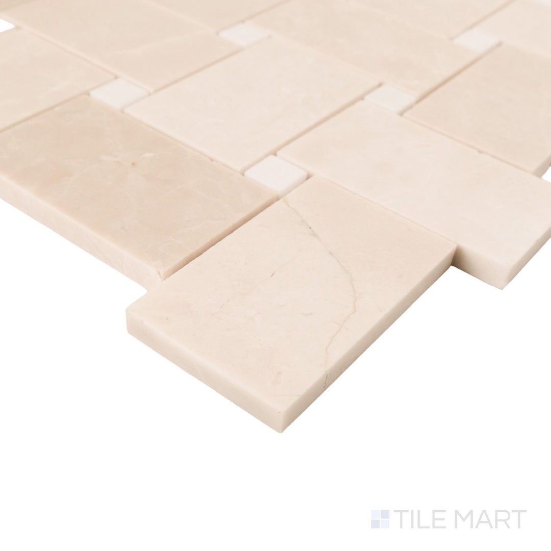 Corner detail of jumbo basketweave beige marble mosaic with honed finish and Thassos dot accents