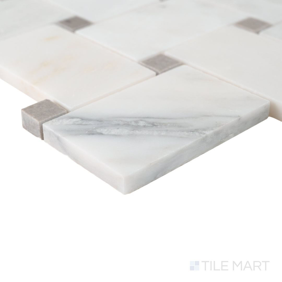 Corner close-up of Jumbo Basketweave Oriental White with Cinder Grey dot honed marble mosaic showing balanced neutral tones.