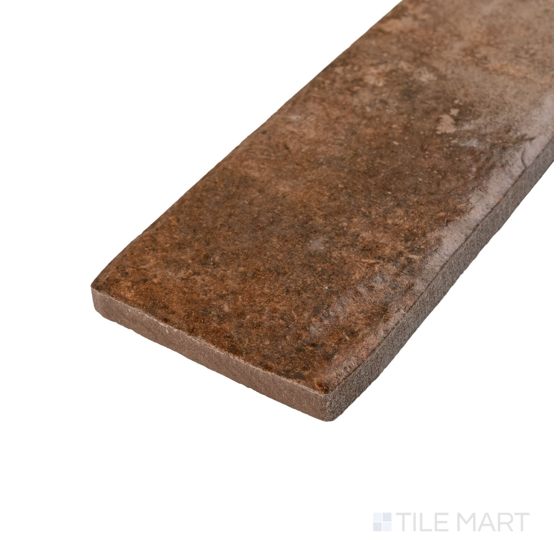 Montana Bitterroot 2.5x10 matte porcelain tile shown at corner angle with warm earthy color and smooth surface