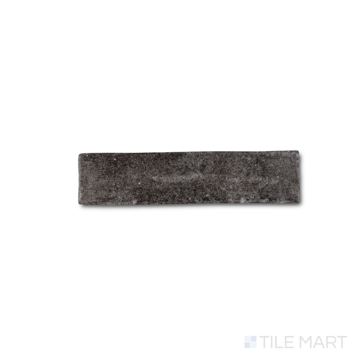 Close-up of Montana Rock Creek 2.5x10 matte porcelain tile revealing grounded hues and subtle texture