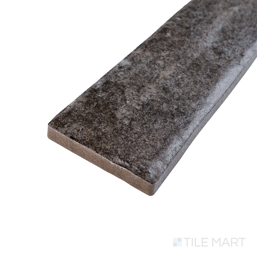Corner angle of Montana Rock Creek 2.5x10 matte porcelain tile showcasing grounded hues and soft surface detail