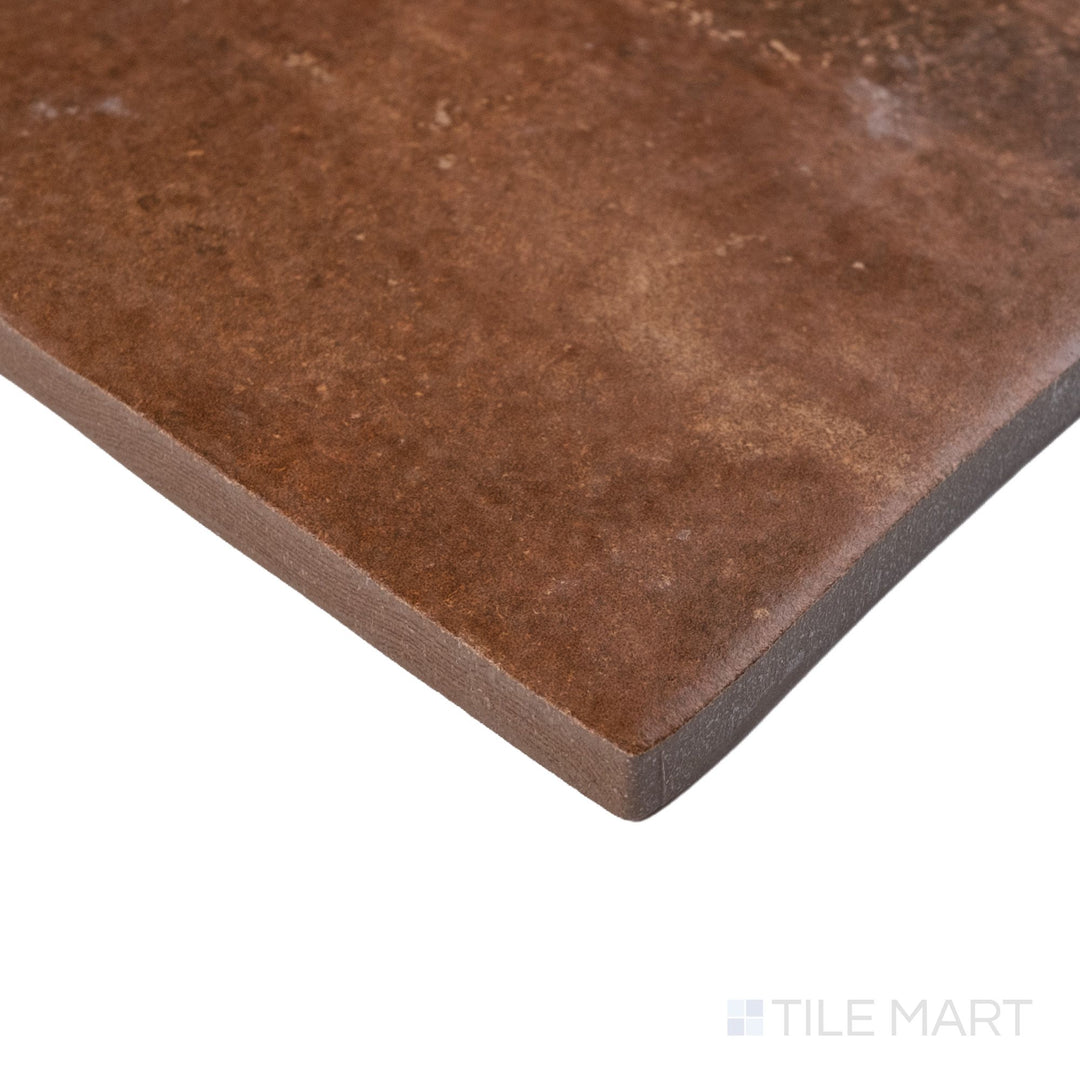 Montana Bitterroot 5x10 matte porcelain tile shown at corner angle with warm earthy color and refined surface