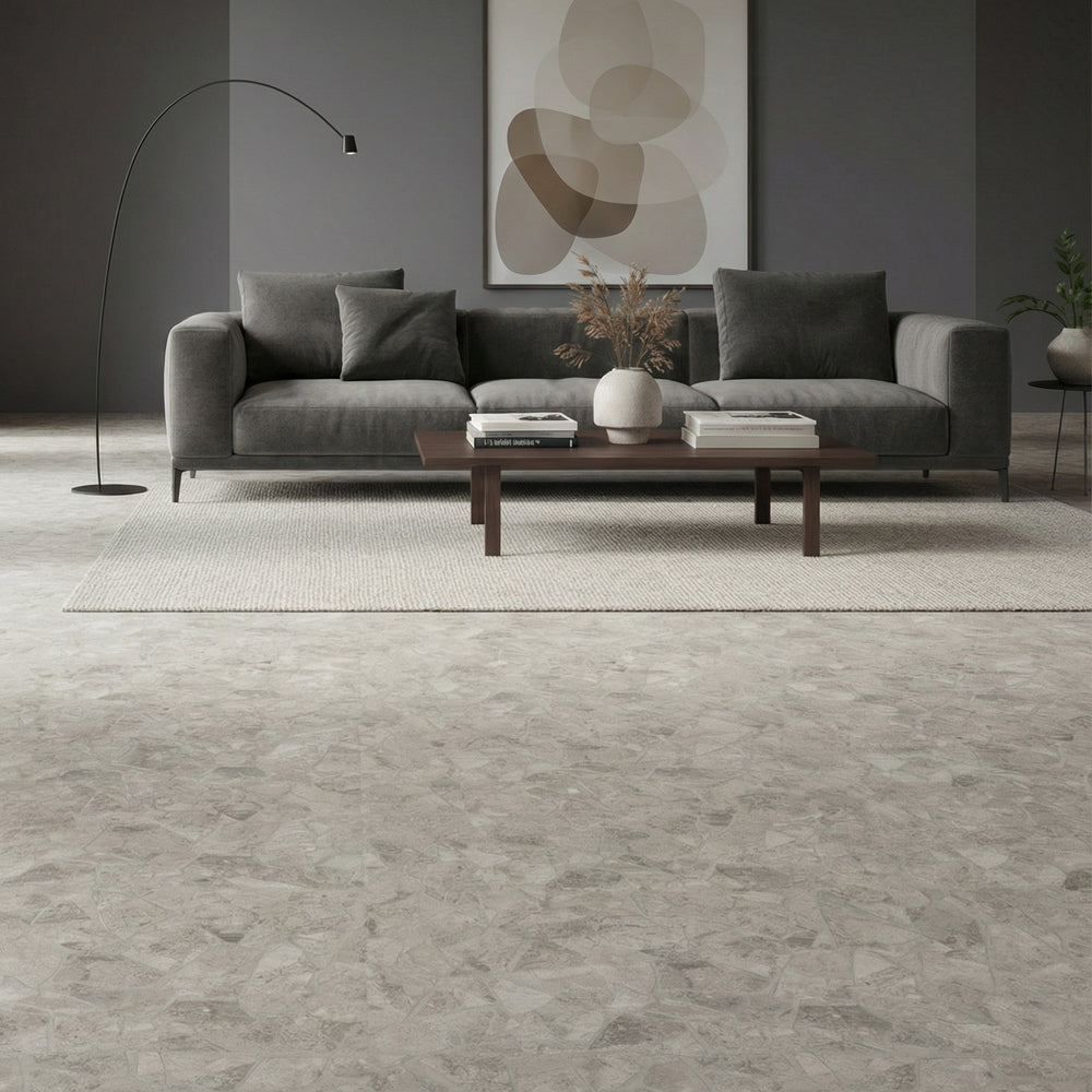 Frammenta Light Grey 24x24 matte porcelain tile showcased in a modern space with subtle tonal movement