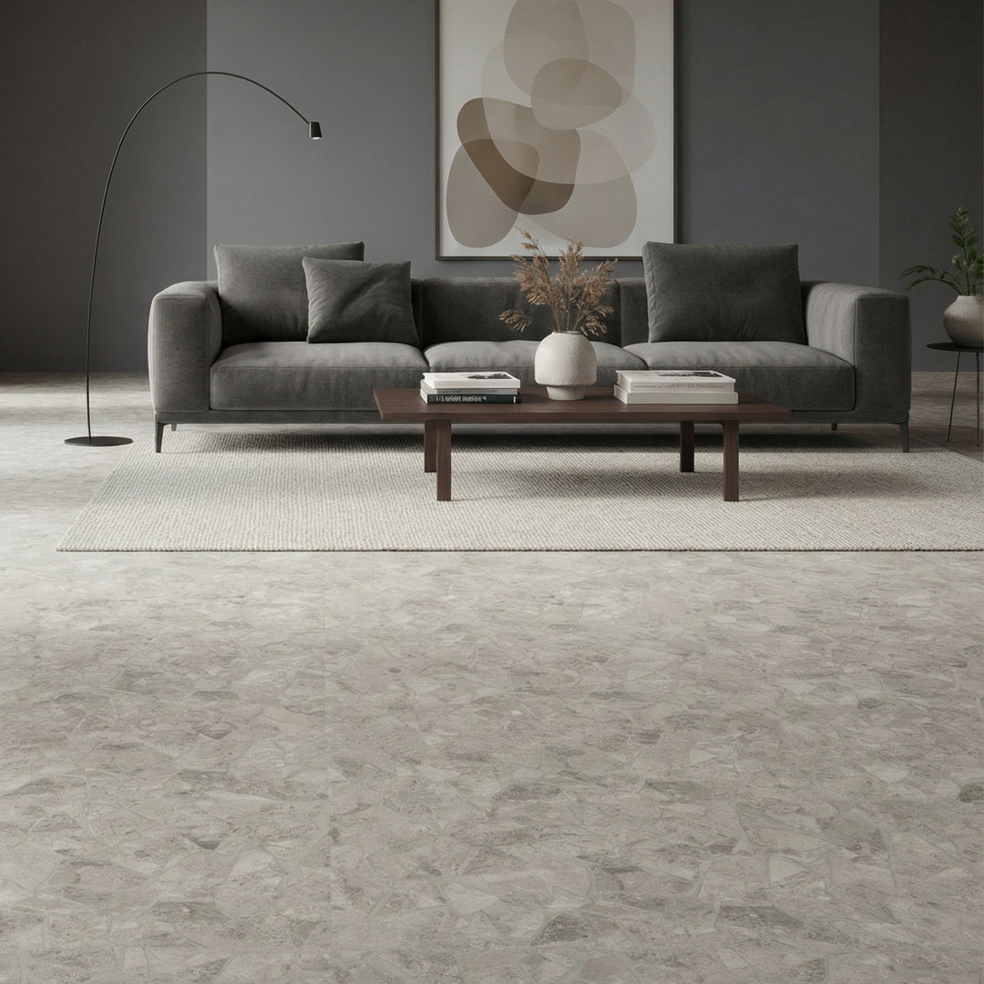 Frammenta Light Grey 24x24 matte porcelain tile showcased in a modern space with subtle tonal movement