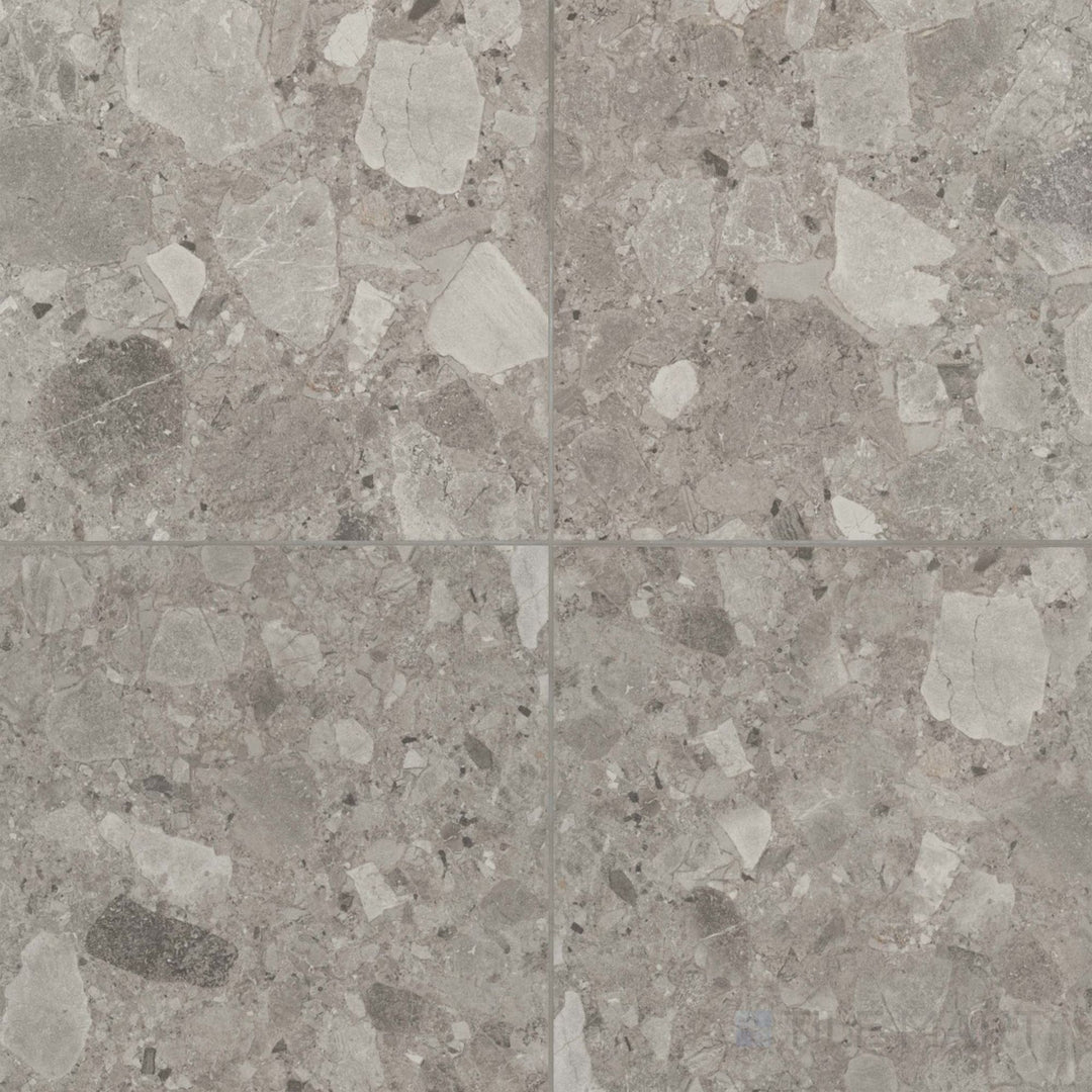 Frammenta Dark Grey 24x24 matte porcelain tile showcasing bold contrast and modern stone character