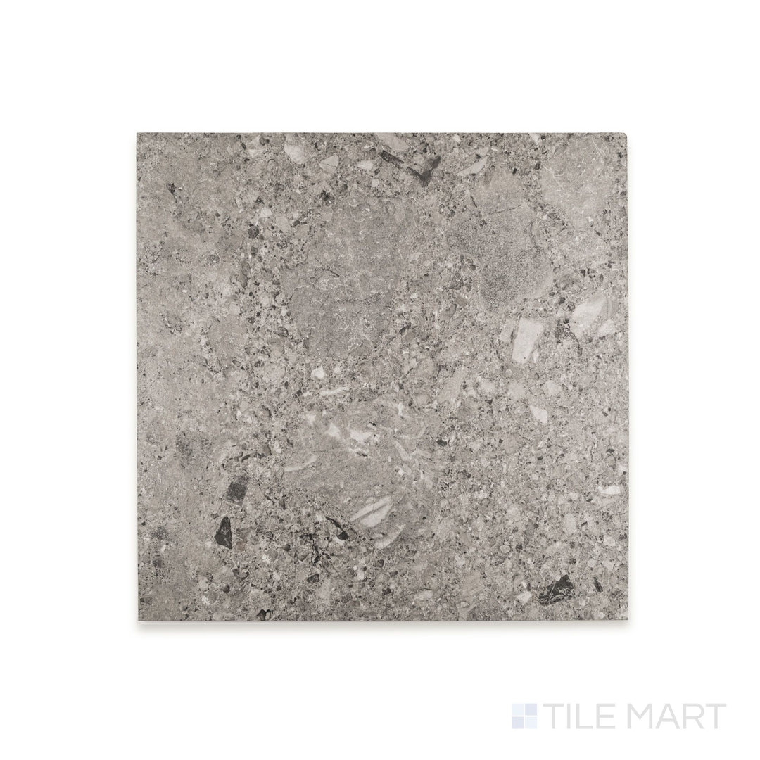 Close view of Frammenta Dark Grey 24x24 matte porcelain tile revealing bold contrast and matte surface