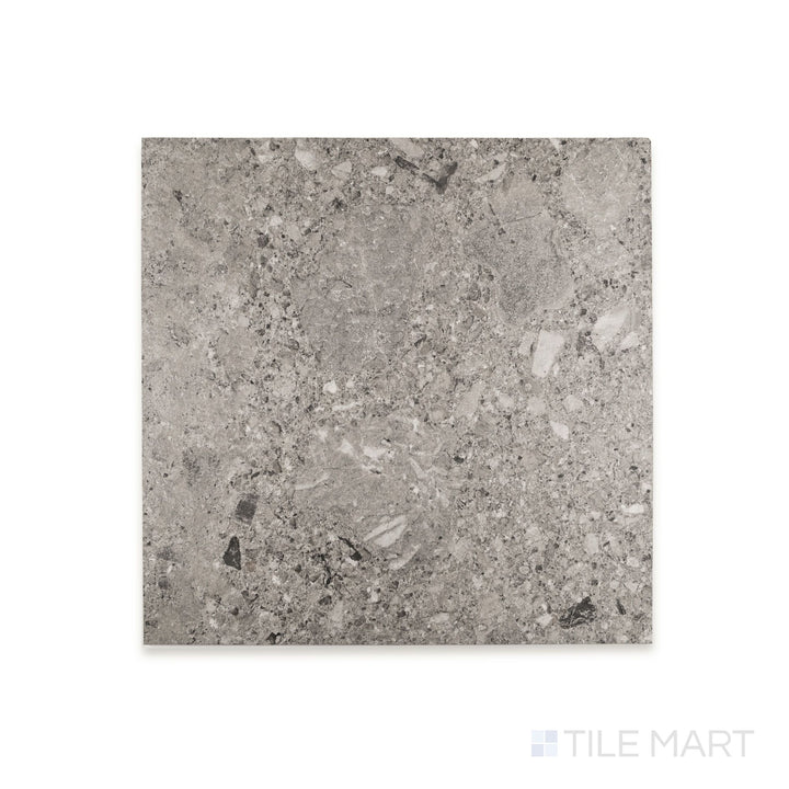 Close view of Frammenta Dark Grey 24x24 matte porcelain tile revealing bold contrast and matte surface