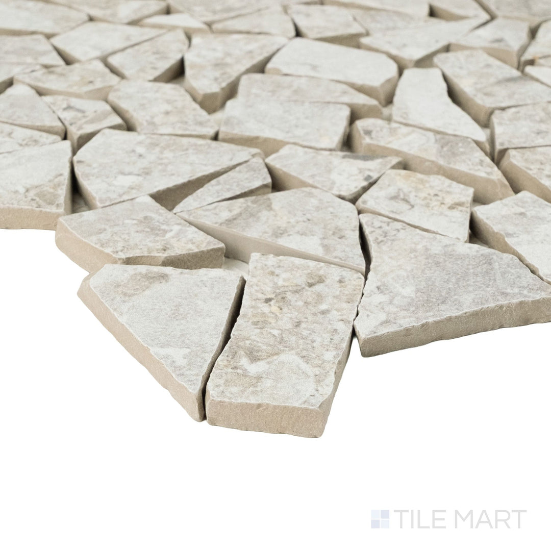 Corner view of Frammenta White Palladiana mosaic highlighting organic stone pattern and broken-edge geometry
