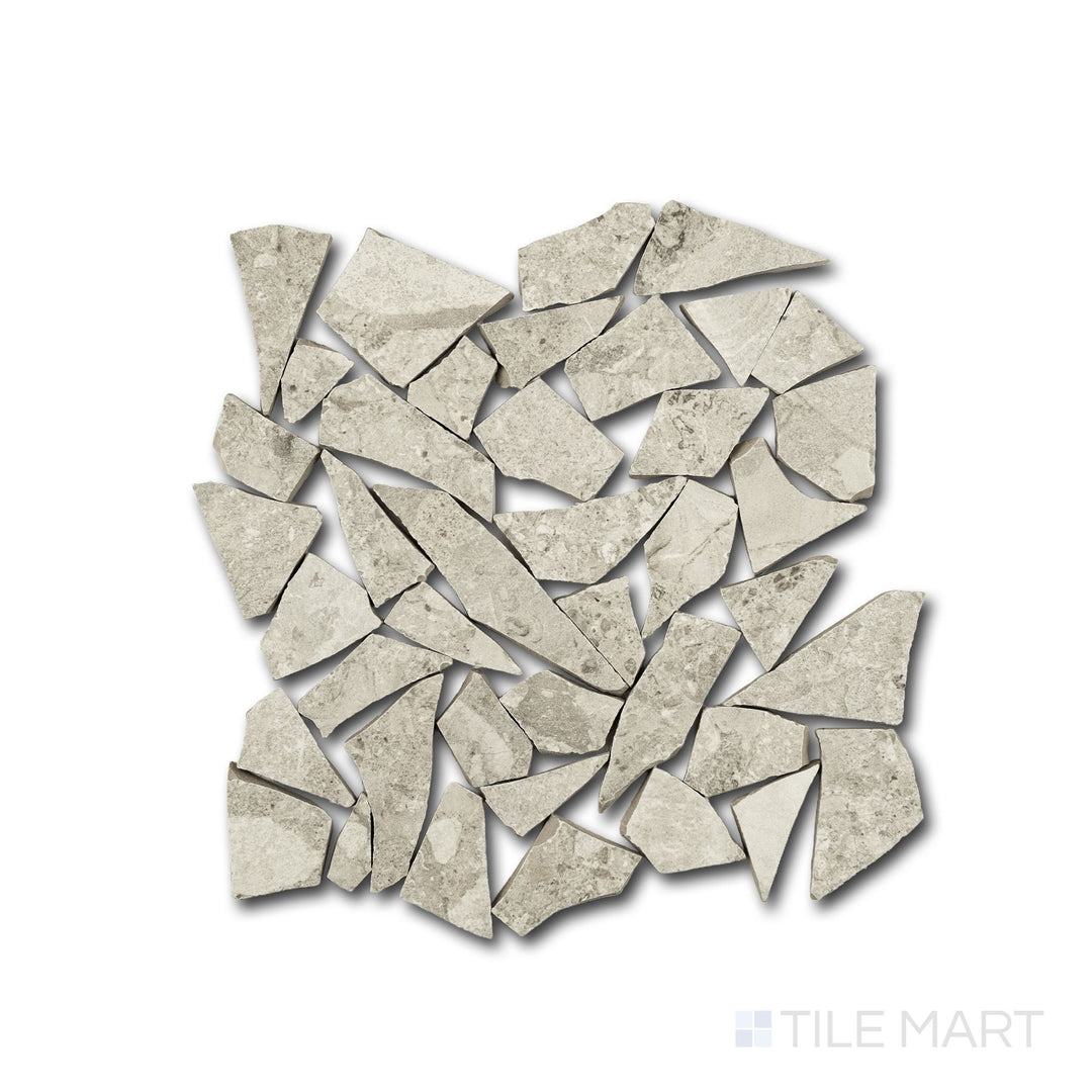 Top-down shot of Frammenta Beige Palladiana mosaic highlighting organic geometry and warm tones