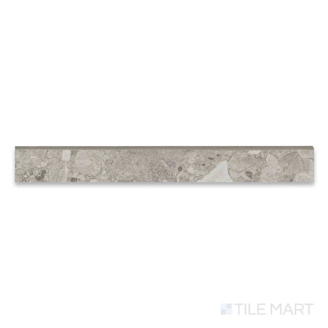 Top-down detail of Frammenta Light Grey 3x24 matte porcelain bullnose with refined edge finish