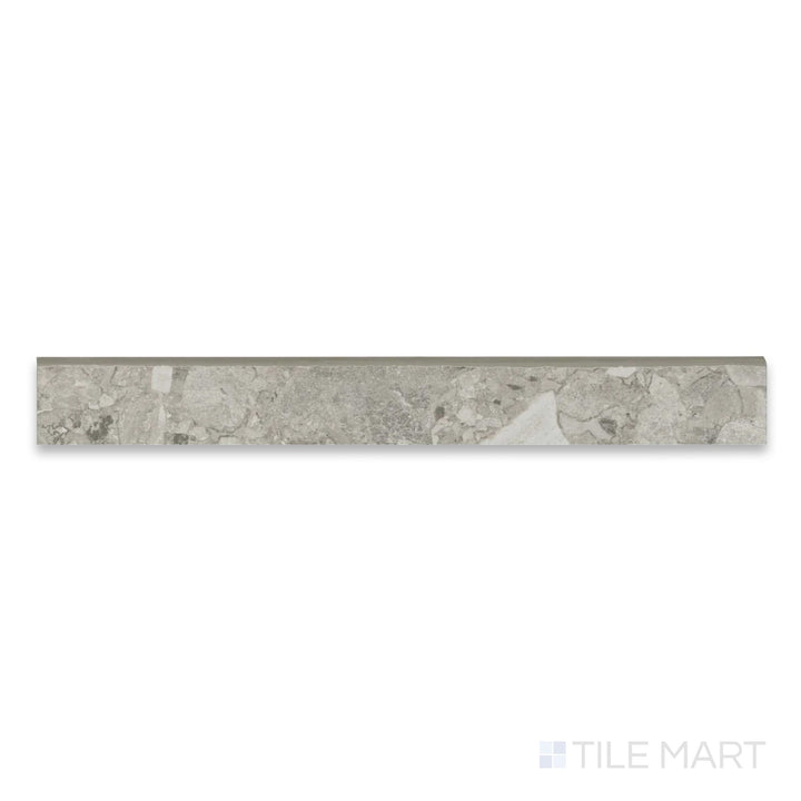 Top-down detail of Frammenta Light Grey 3x24 matte porcelain bullnose with refined edge finish