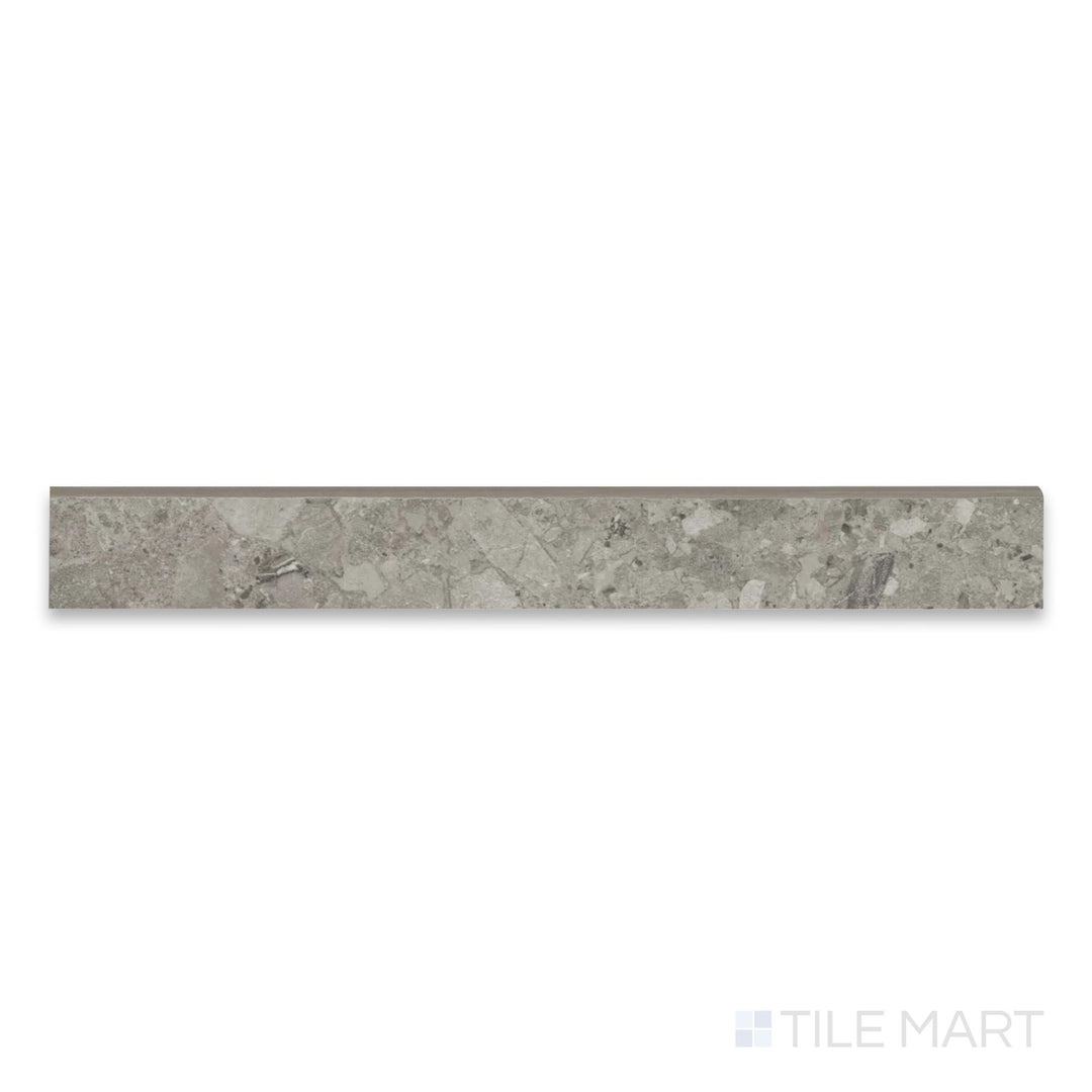 Full-piece view of Frammenta Dark Grey 3x24 matte porcelain bullnose revealing clean rounded trim