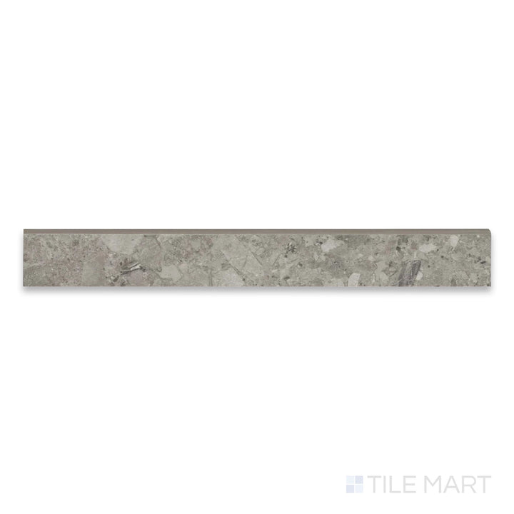 Full-piece view of Frammenta Dark Grey 3x24 matte porcelain bullnose revealing clean rounded trim