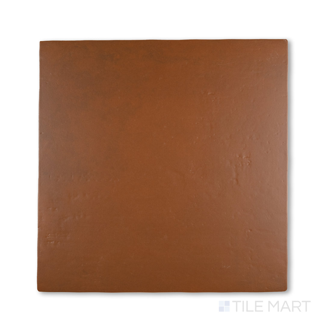 Top-down photo of Cotto Nature Sicilia 14x14 matte porcelain tile, displaying subtle terracotta hues and a soft, aged surface finish.