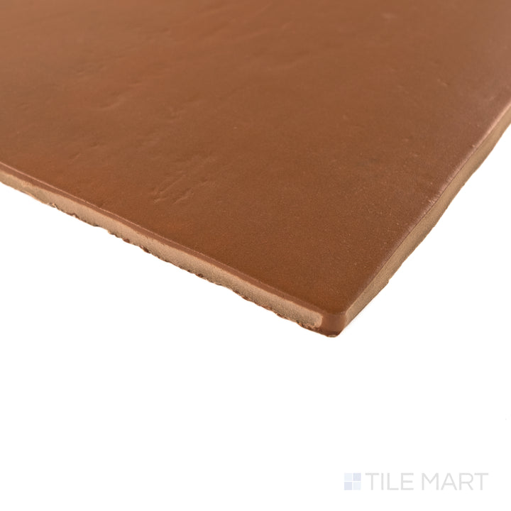 Corner detail of Cotto Nature Sicilia 14x14 matte porcelain tile highlighting earthy hue and soft rustic finish.