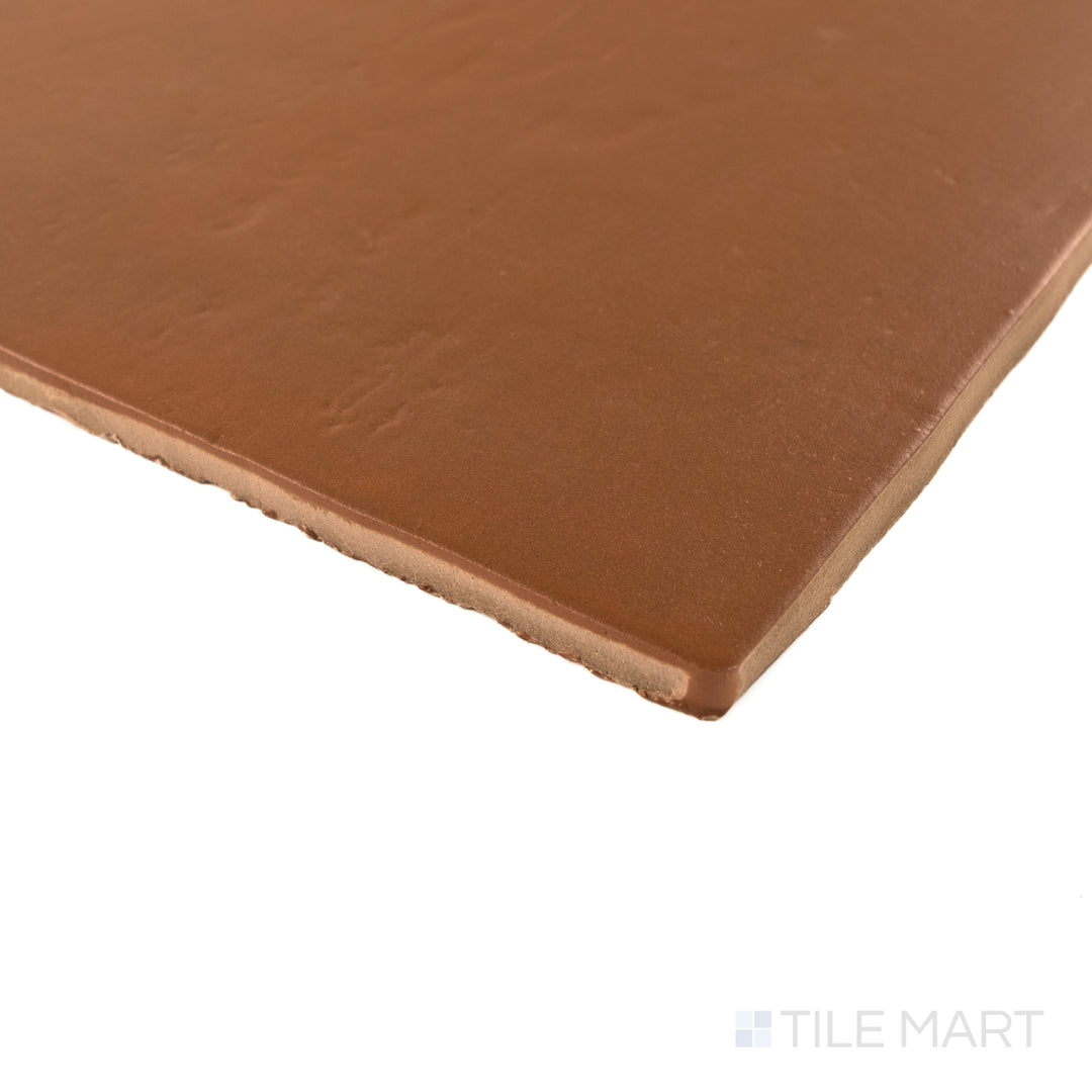 Corner detail of Cotto Nature Sicilia 14x14 matte porcelain tile highlighting earthy hue and soft rustic finish.