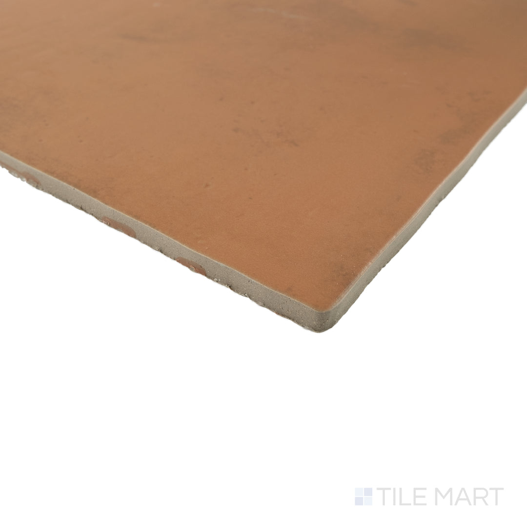 Corner view of Cotto Nature Siena 14x14 matte porcelain tile capturing rich tone and handcrafted matte surface.
