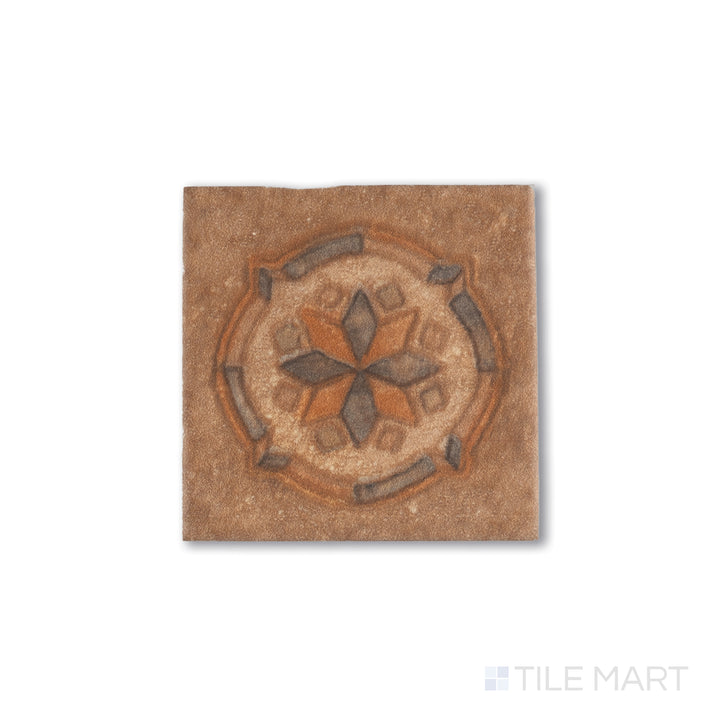 Top-down view of Cotto Nature Tira Sandro 3x3 hand-painted gloss porcelain dot, displaying a traditional decorative motif with a glossy finish and artisanal detail.