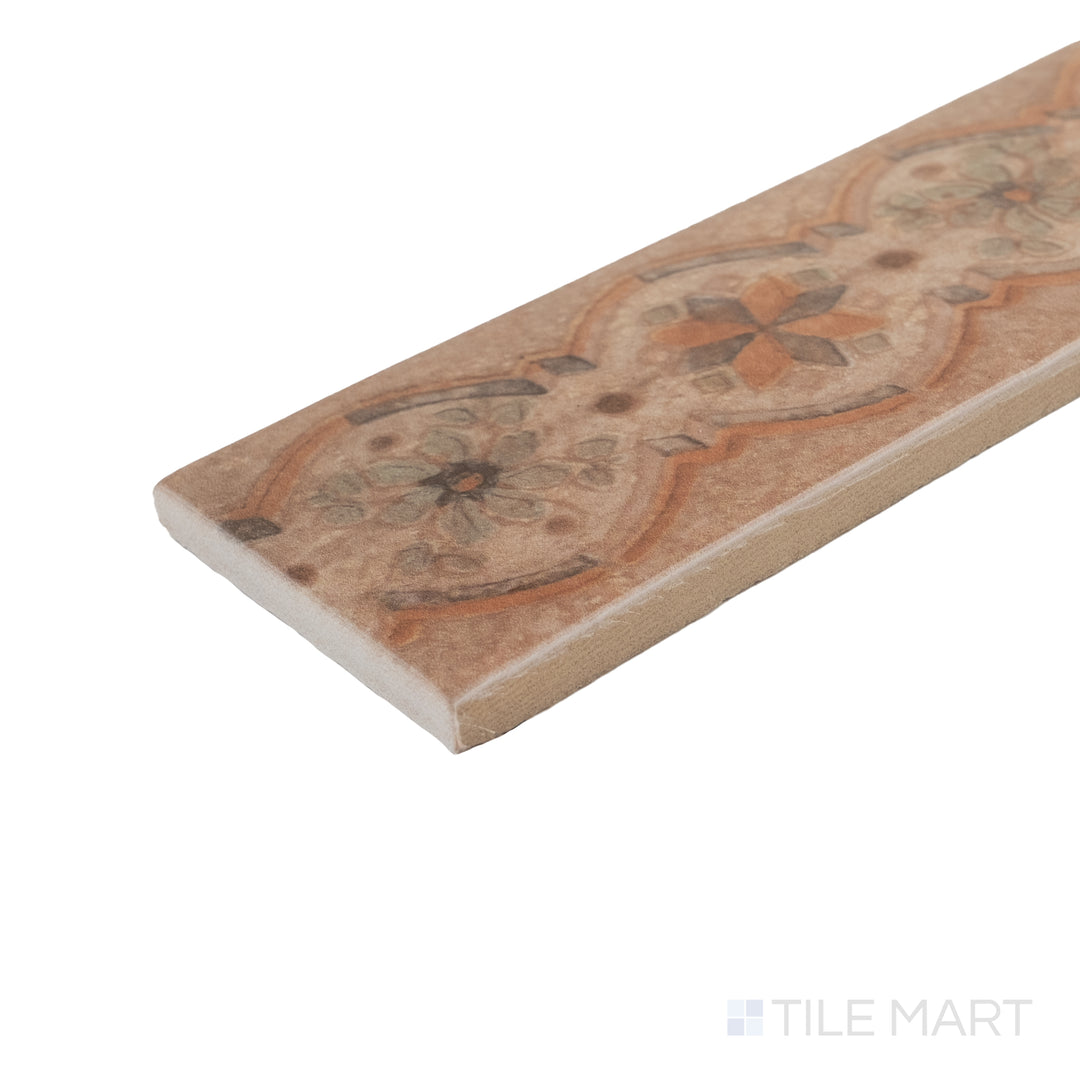 Corner detail of Cotto Nature Tira Sandro 3x14 deco hand-painted gloss porcelain liner featuring smooth edge and color depth.