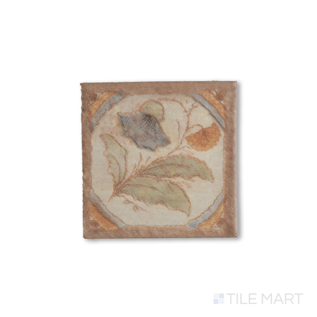 Flat-lay photo of Cotto Nature Tira Versilia 3x3 gloss porcelain dot, highlighting a classical motif in blue tones with intricate brushwork.