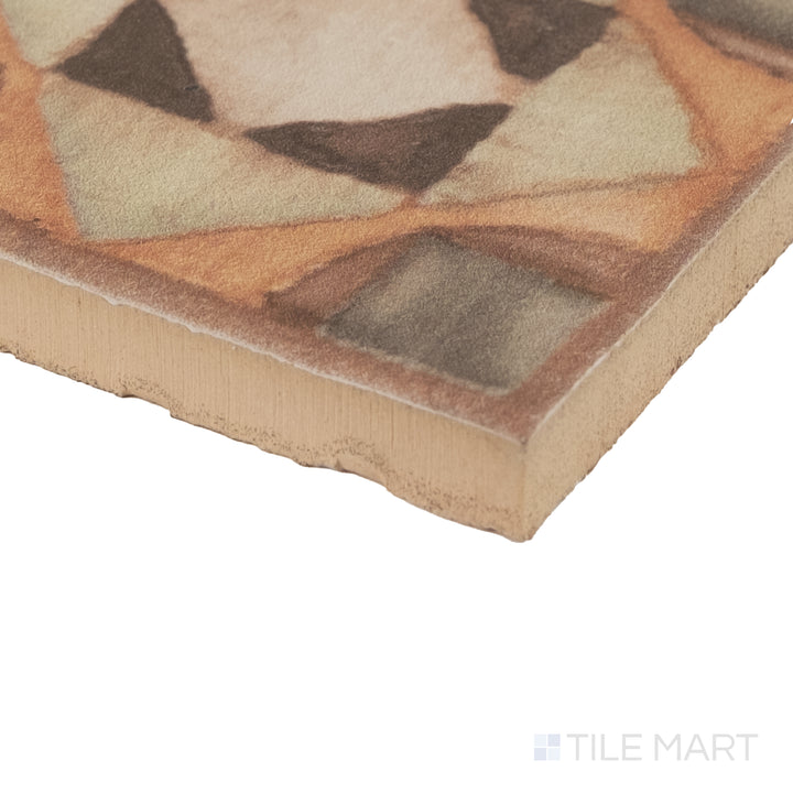 Corner detail of Cotto Nature Tira Volterra 3x3 deco hand-painted gloss porcelain dot showing rich glaze and artisanal surface.