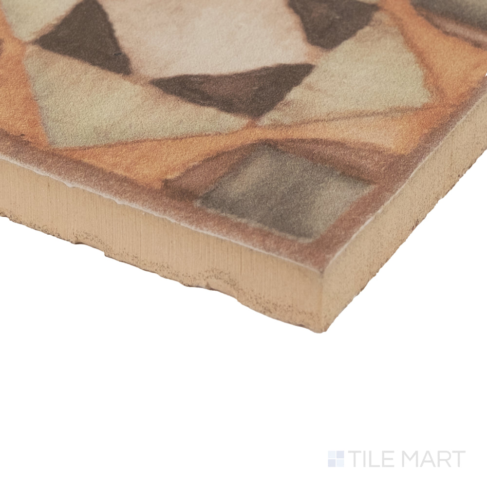 Corner detail of Cotto Nature Tira Volterra 3x3 deco hand-painted gloss porcelain dot showing rich glaze and artisanal surface.