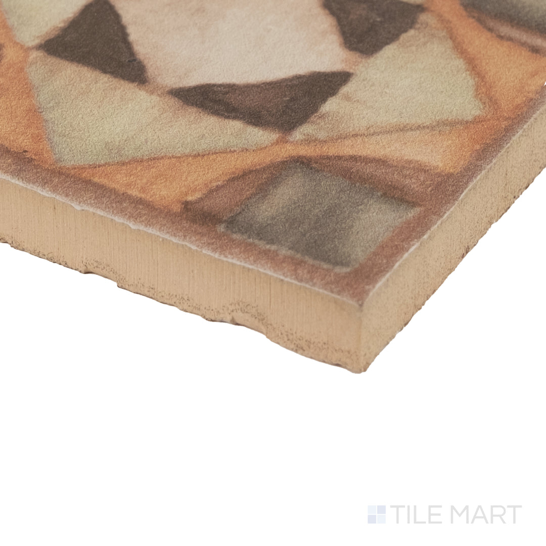 Corner detail of Cotto Nature Tira Volterra 3x3 deco hand-painted gloss porcelain dot showing rich glaze and artisanal surface.