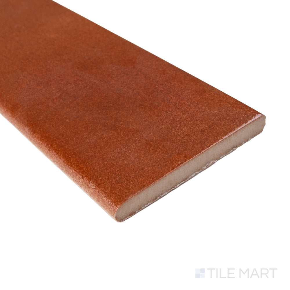 Cotto Nature Sicilia 4x14 gloss porcelain bullnose in corner view revealing sleek finish and refined edge