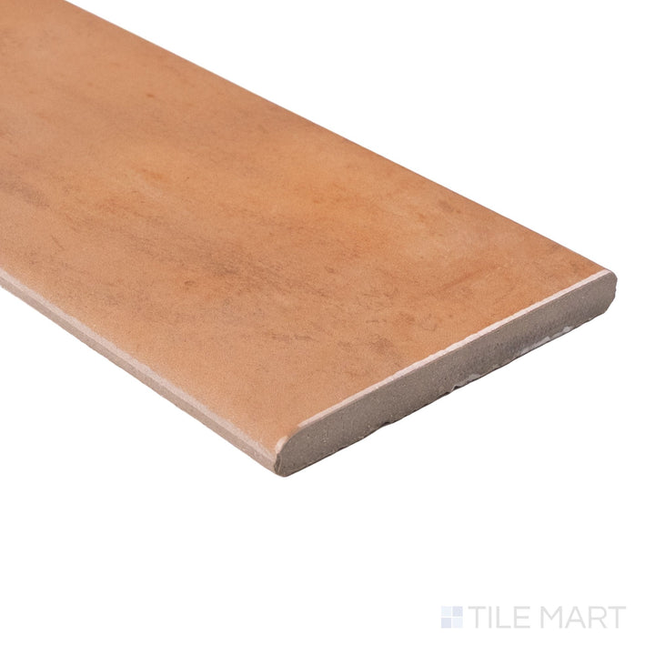 Corner angle of Cotto Nature Siena 4x14 gloss porcelain bullnose highlighting glossy surface and eased profile