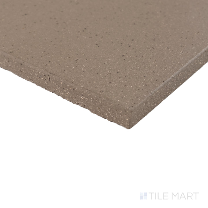 Corner detail of Metropolitan Puritan Gray 6x6 honed quarry tile highlighting its cool neutral shade and fine texture.