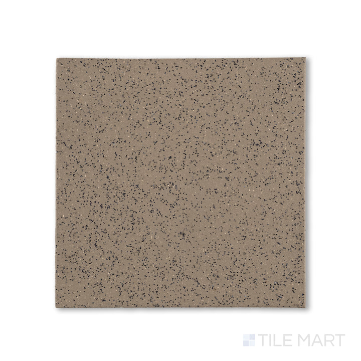 Top-down shot of Metropolitan Puritan Gray 6x6 XA abrasive honed quarry tile, blending a gritty finish with a mid-tone gray color for commercial safety.