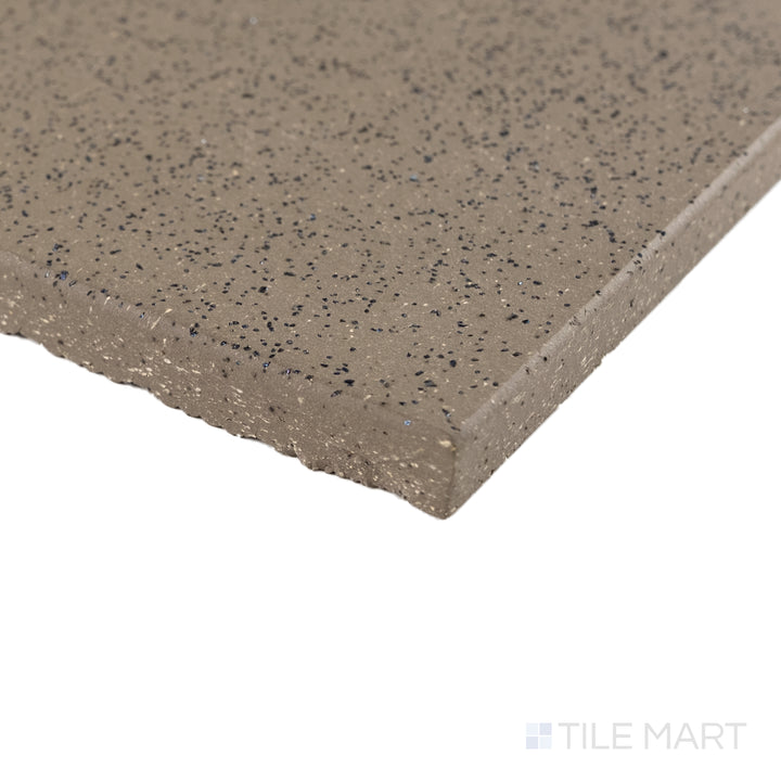 Corner detail of Metropolitan Puritan Gray 6x6 XA abrasive honed quarry tile highlighting textured grip and smooth edge.