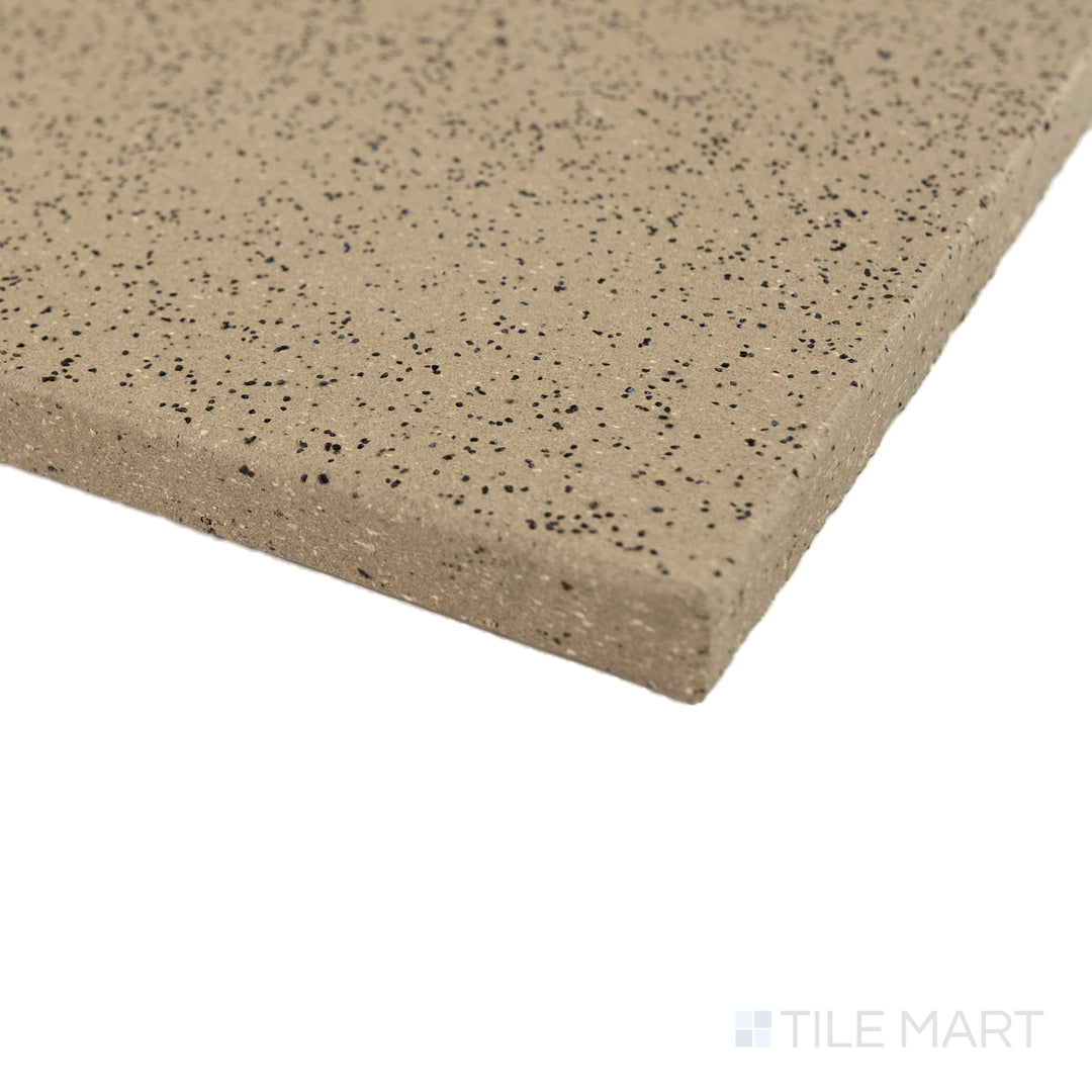 Corner close-up of Metropolitan Buckskin 6x6 XA abrasive honed quarry tile showing textured surface and grip detail.