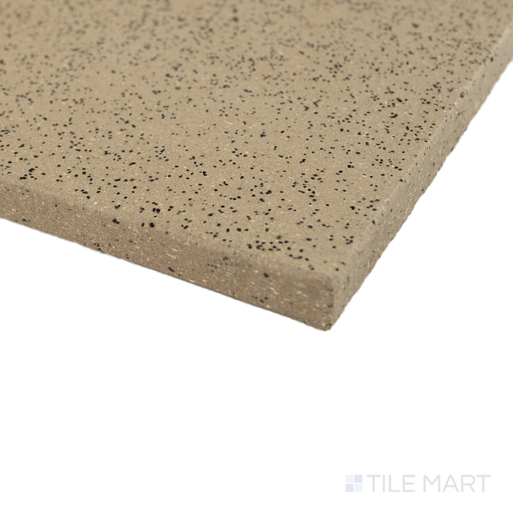 Corner close-up of Metropolitan Buckskin 6x6 XA abrasive honed quarry tile showing textured surface and grip detail.