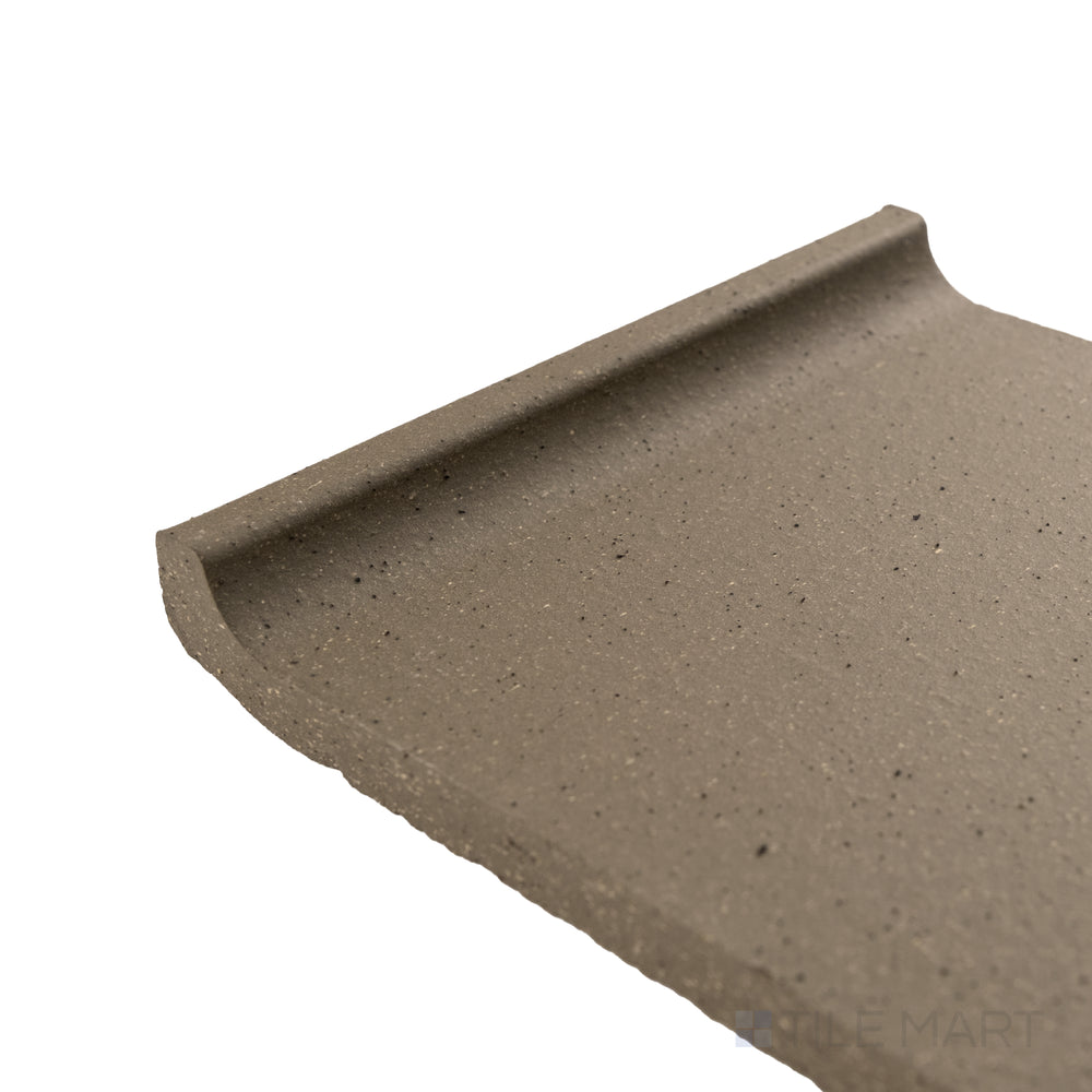 Corner view of Metropolitan Puritan Gray 6x6 honed quarry cove base highlighting neutral tone and clean edge profile.