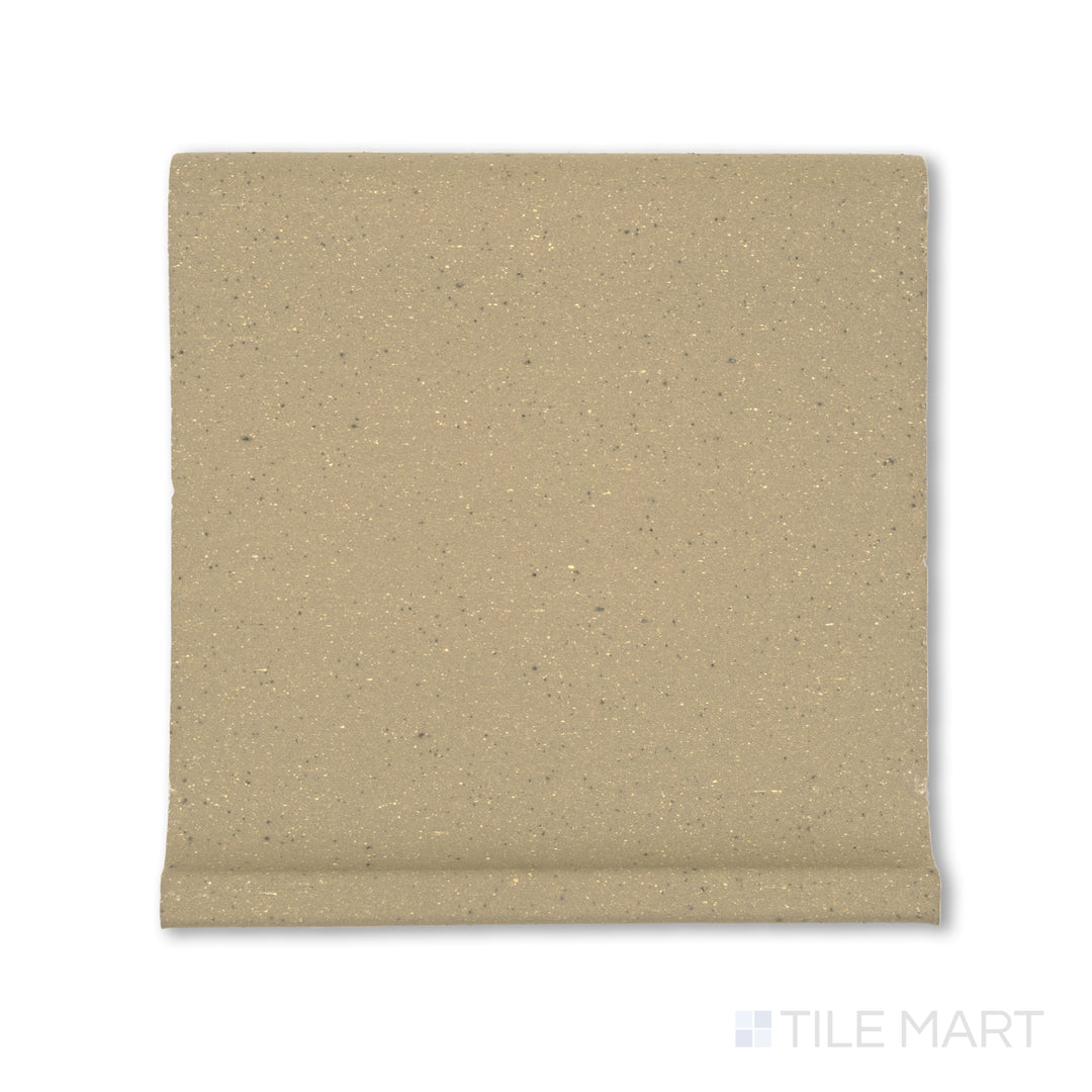 Flat-lay view of Metropolitan Buckskin 6x6 honed quarry cove base, with its soft brown tone and contoured edge for seamless floor-to-wall coverage.