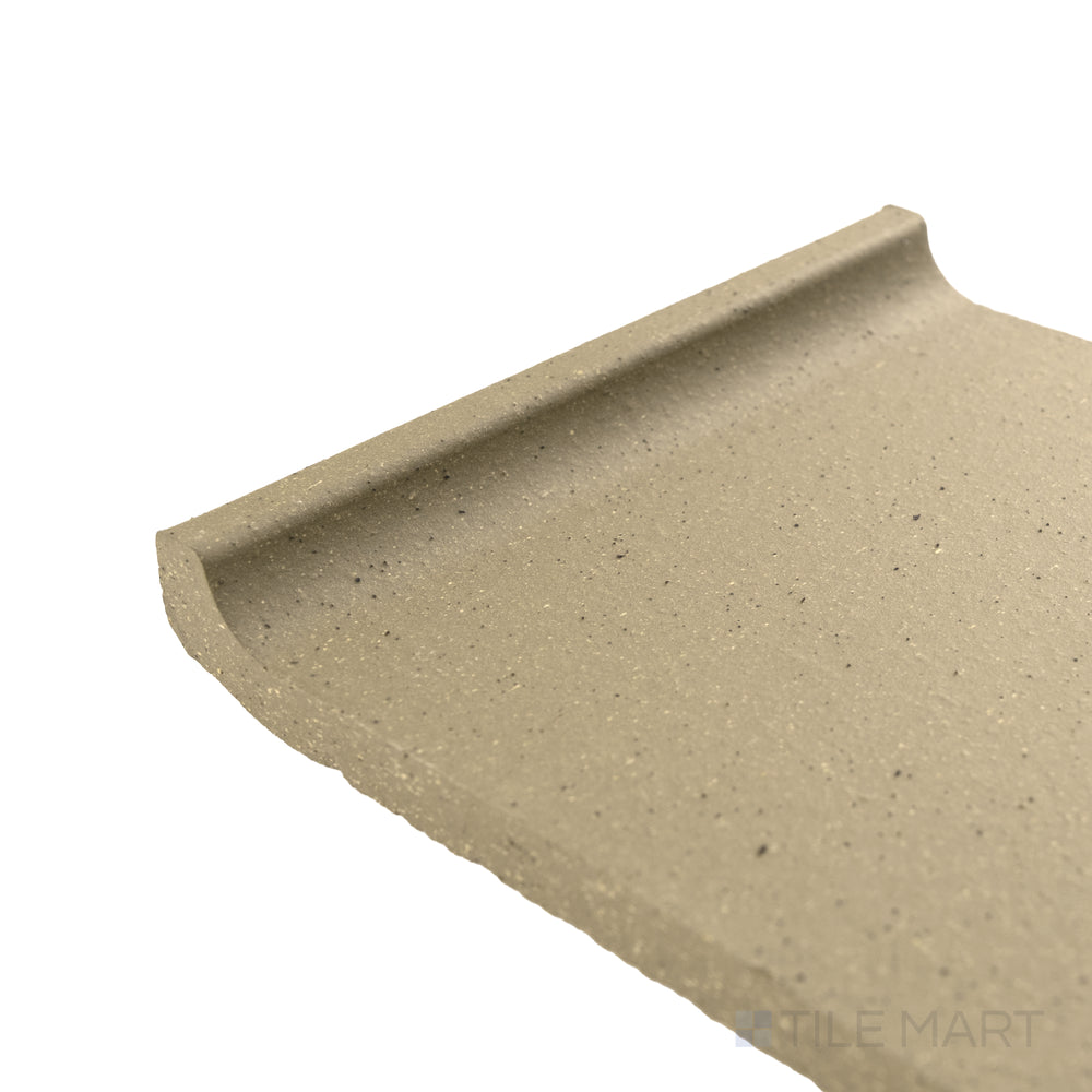 Corner close-up of Metropolitan Buckskin 6x6 honed quarry cove base capturing warm tone and softly honed texture.