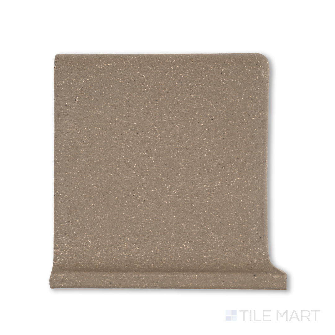 Overhead image of Metropolitan Puritan Gray 6x6 honed quarry cove base left corner, featuring a neutral gray with a curved left-side return for wall junctions.