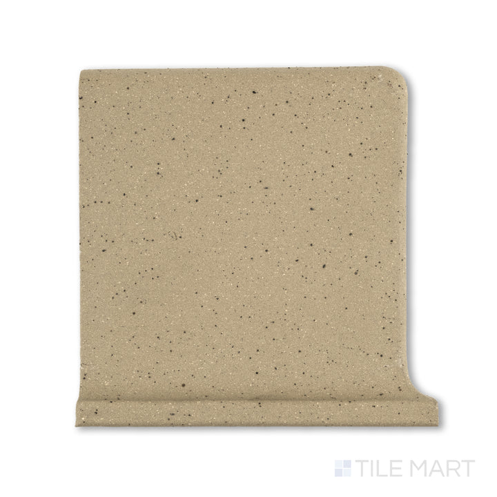 Flat-lay photo of Metropolitan Buckskin 6x6 honed quarry cove base left corner, in warm brown with integrated curved molding for corner installations.