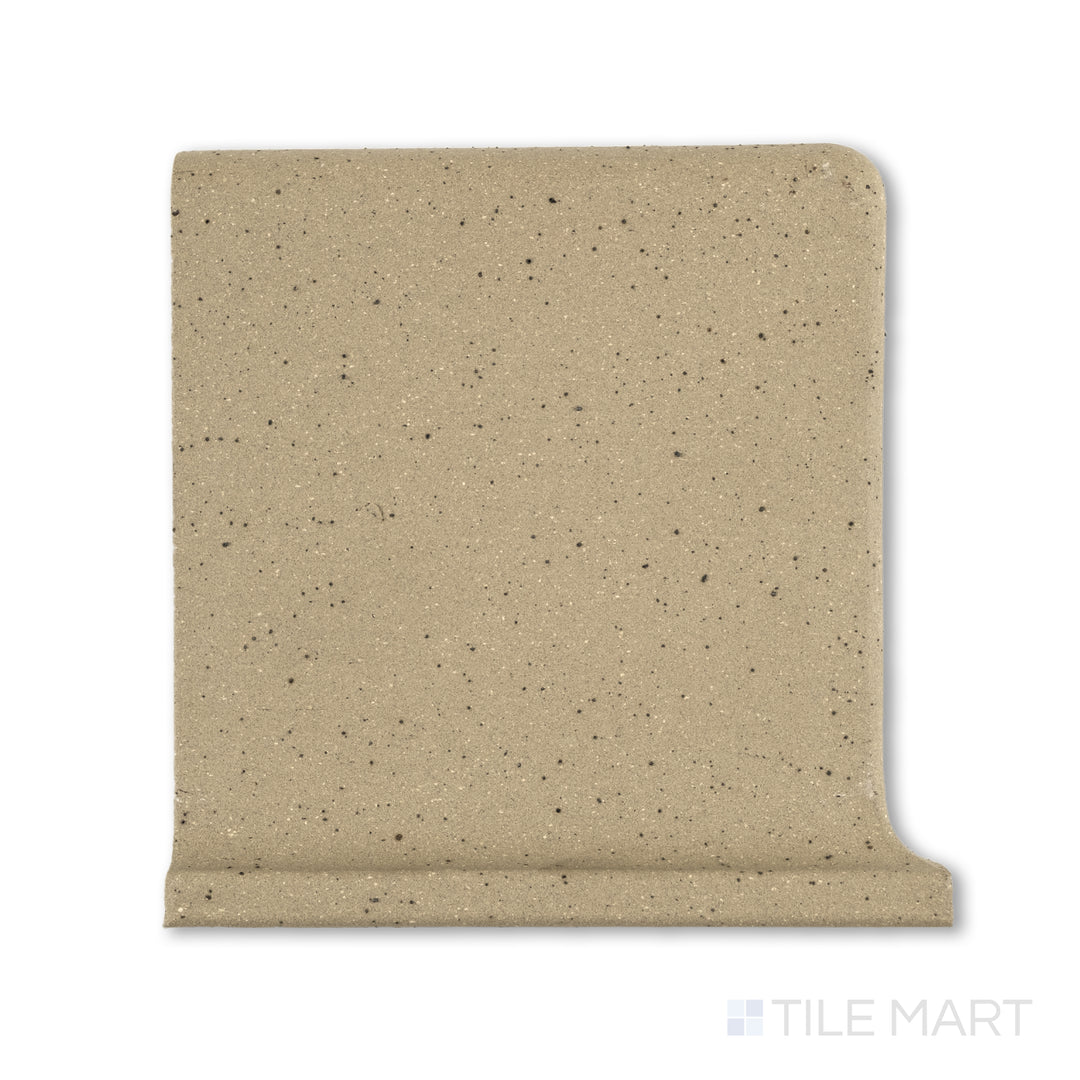 Flat-lay photo of Metropolitan Buckskin 6x6 honed quarry cove base left corner, in warm brown with integrated curved molding for corner installations.