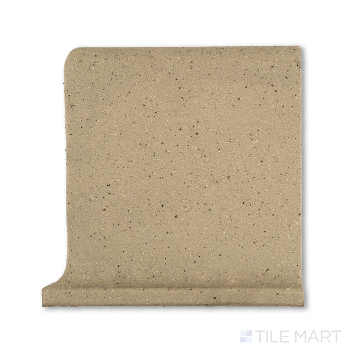 Flat-lay image of Metropolitan Buckskin 6x6 honed quarry cove base right corner, showing a light brown color and smooth curve on the right edge for seamless corner tiling.
