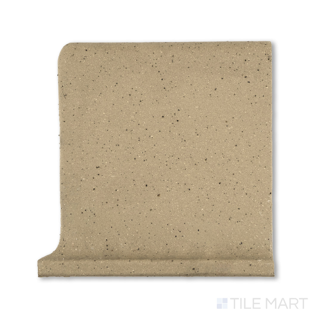 Flat-lay image of Metropolitan Buckskin 6x6 honed quarry cove base right corner, showing a light brown color and smooth curve on the right edge for seamless corner tiling.